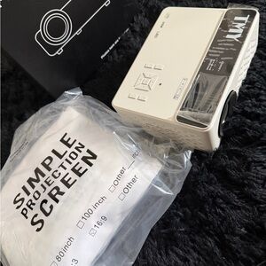 Compact White Mini Projector with Simple Projection Screen